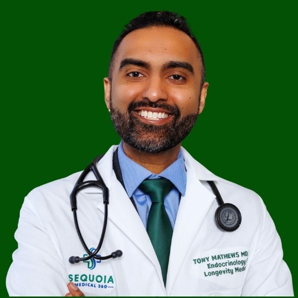 Dr. Tony Mathews, MD, MPH, Endocrinologist and Longevity Medicine specialist at Sequoia Medical 360, smiling confidently.